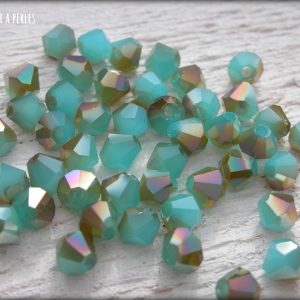 50 Toupies 4 mm Turquoise Opal AB