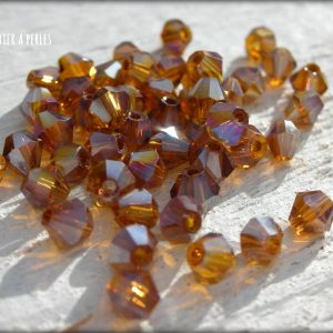 50 Toupies 4 mm Topaz AB