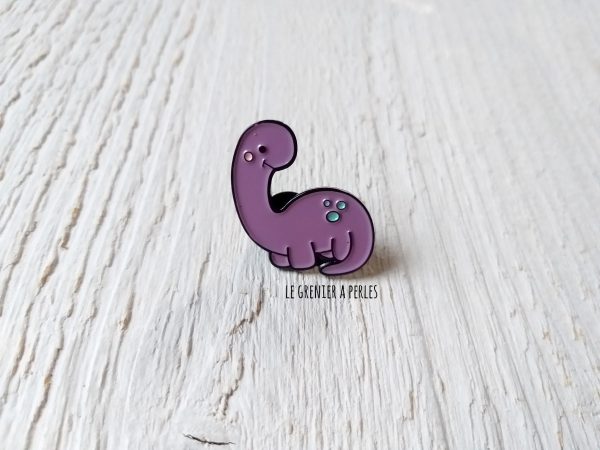 Pin's Dino mauve * Pin's en émail