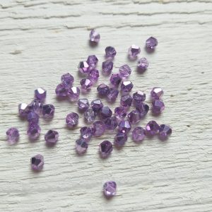 50 Toupies 4 mm Metallic Mauve