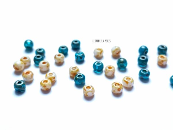 perles trica Teal Blue and White Picasso Finish